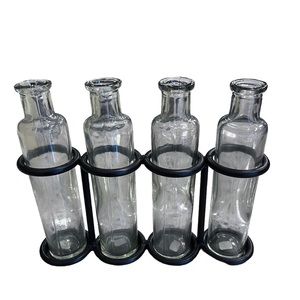 Vintage Propagation Planter
Station. Four Bottle Bud Vases with Metal Stand.